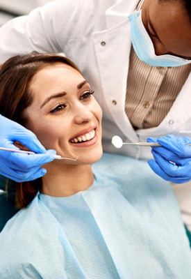 Woman about to undergo dental exam