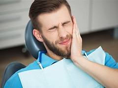 man with chipped tooth