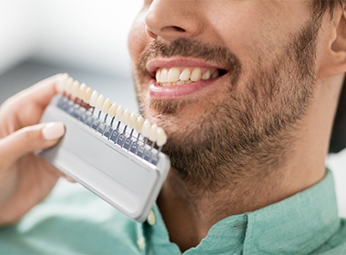 man with beard smiling