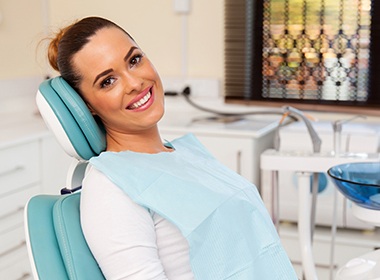 woman in white smiling