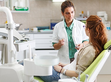 woman talking to woman dentist