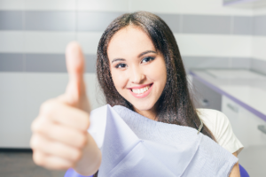 woman happy at dentist