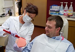 man at preventive dental appointment