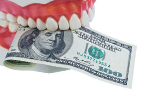 denture holding money