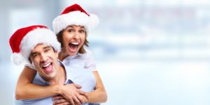 couple wearing Santa hats