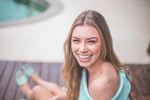 Woman enjoying summer after teeth whitening