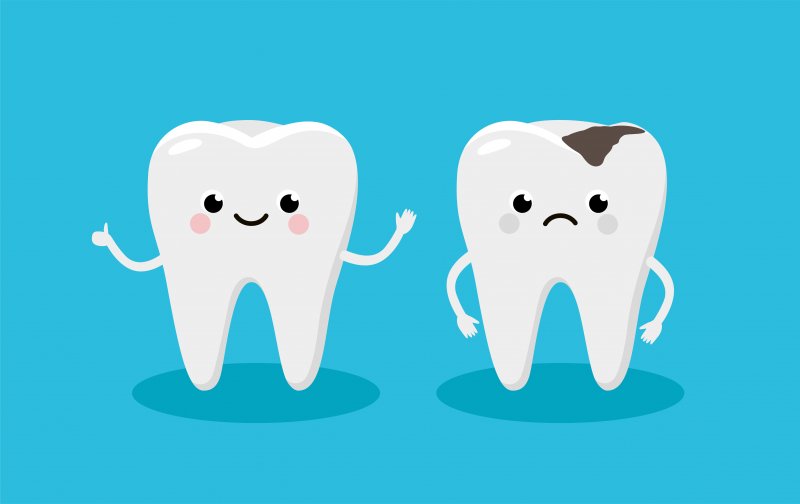 Happy tooth and tooth with cavity